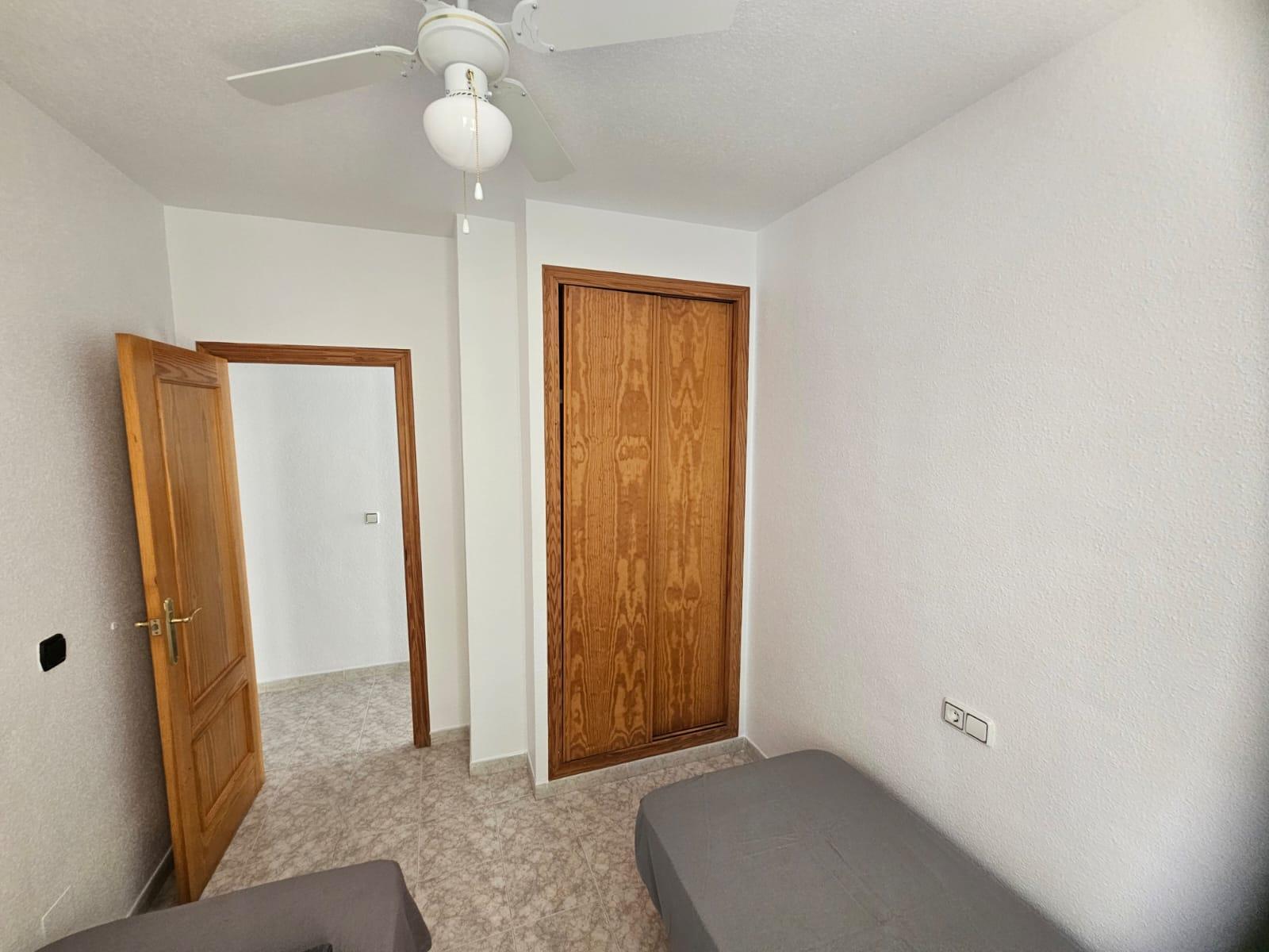 Apartamento con terraza y piscina en Playa Flamenca — 2 dorm. en planta baja