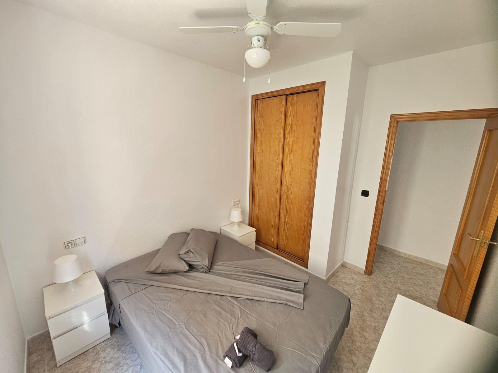 Apartamento con terraza y piscina en Playa Flamenca — 2 dorm. en planta baja