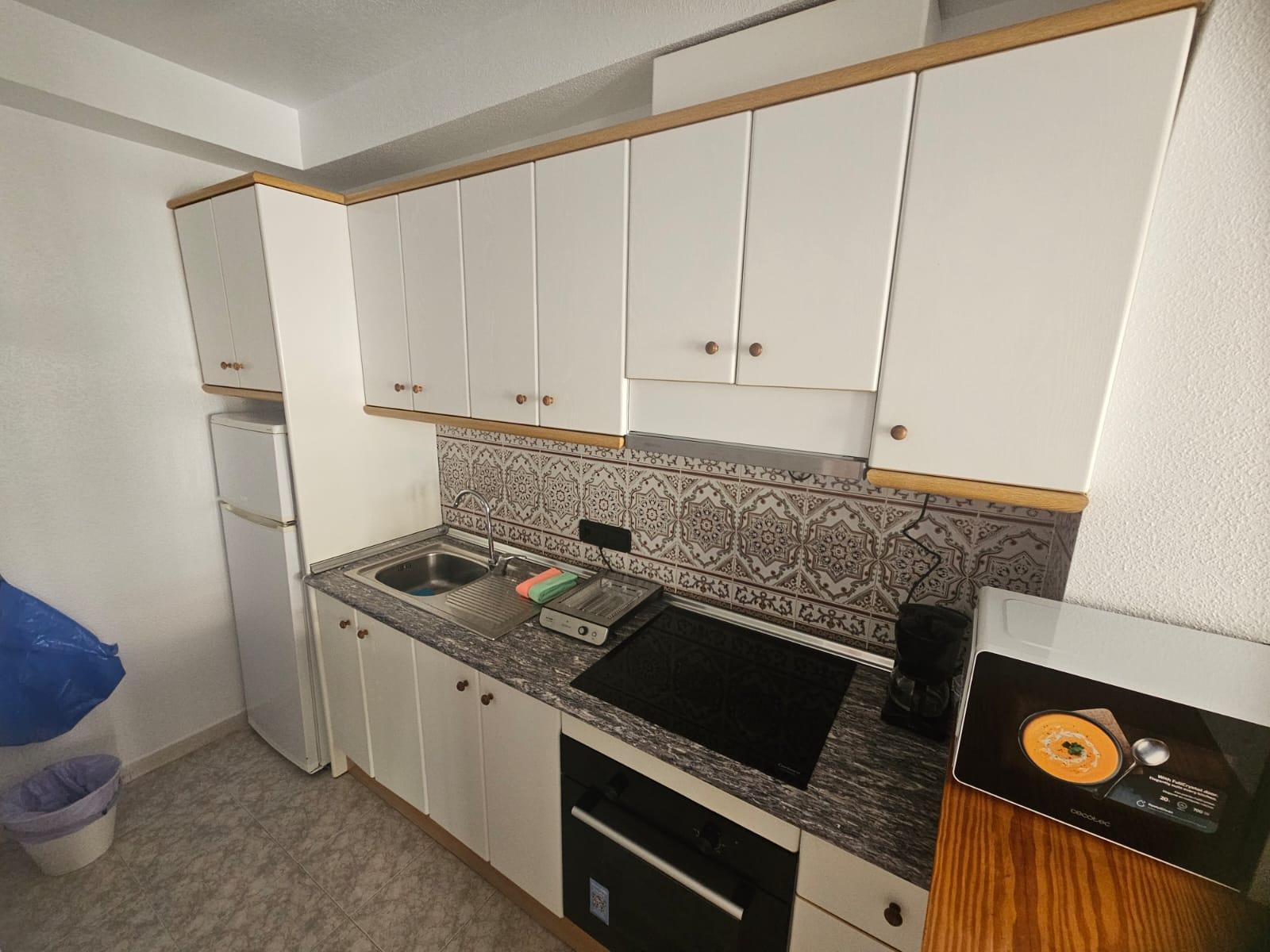 Apartamento con terraza y piscina en Playa Flamenca — 2 dorm. en planta baja