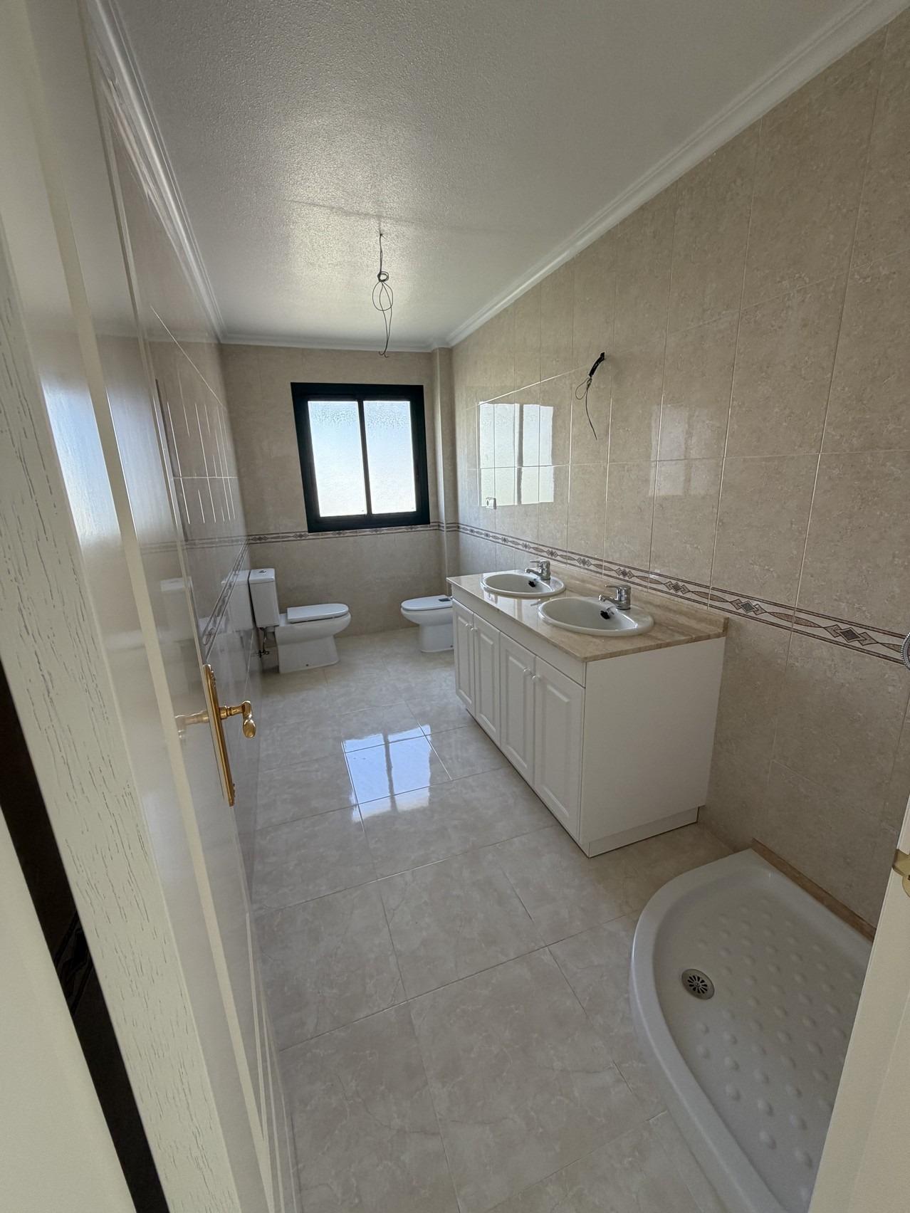 Apartamento de obra nueva con piscina privada en Lomas de Campoamor — 2 dorm.