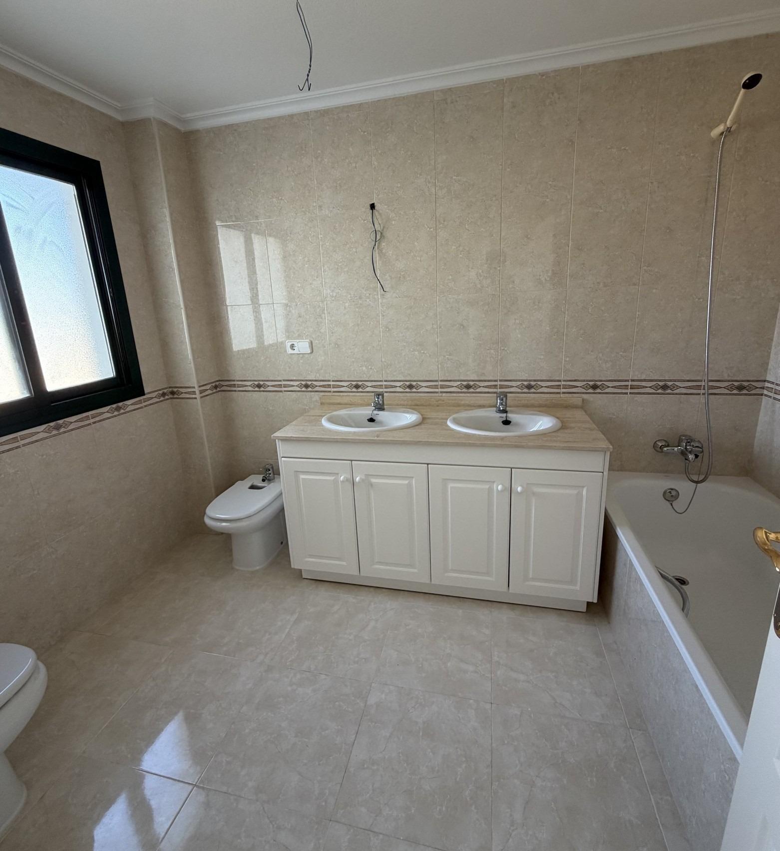 Apartamento de obra nueva con piscina privada en Lomas de Campoamor — 2 dorm.
