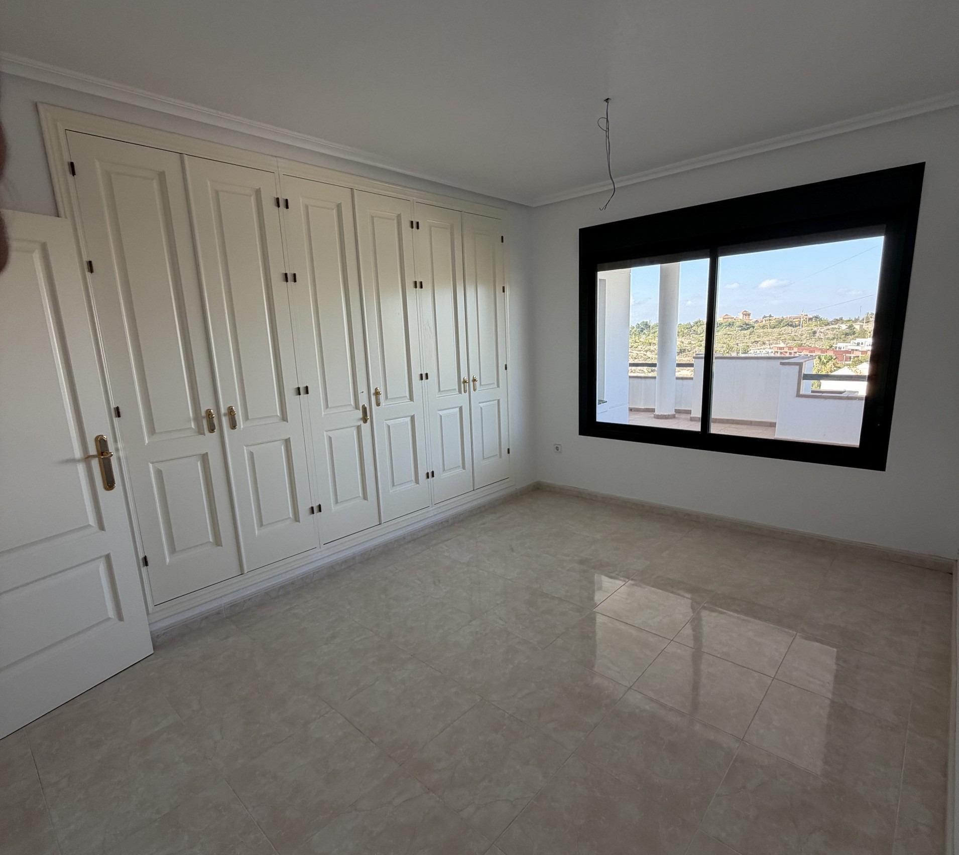 Apartamento de obra nueva con piscina privada en Lomas de Campoamor — 2 dorm.