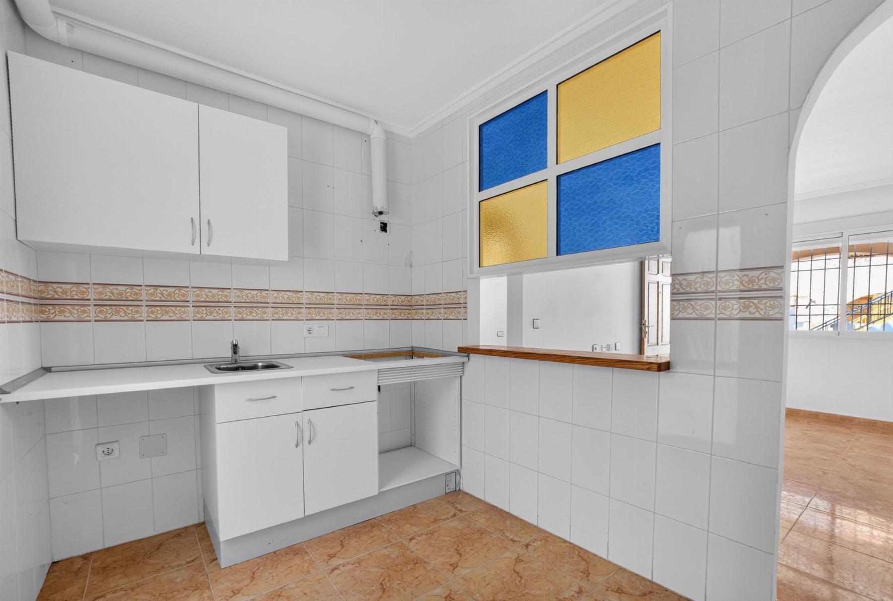 Bungalow bajo con porche privado y piscina en Altos de Limonar, Torrevieja