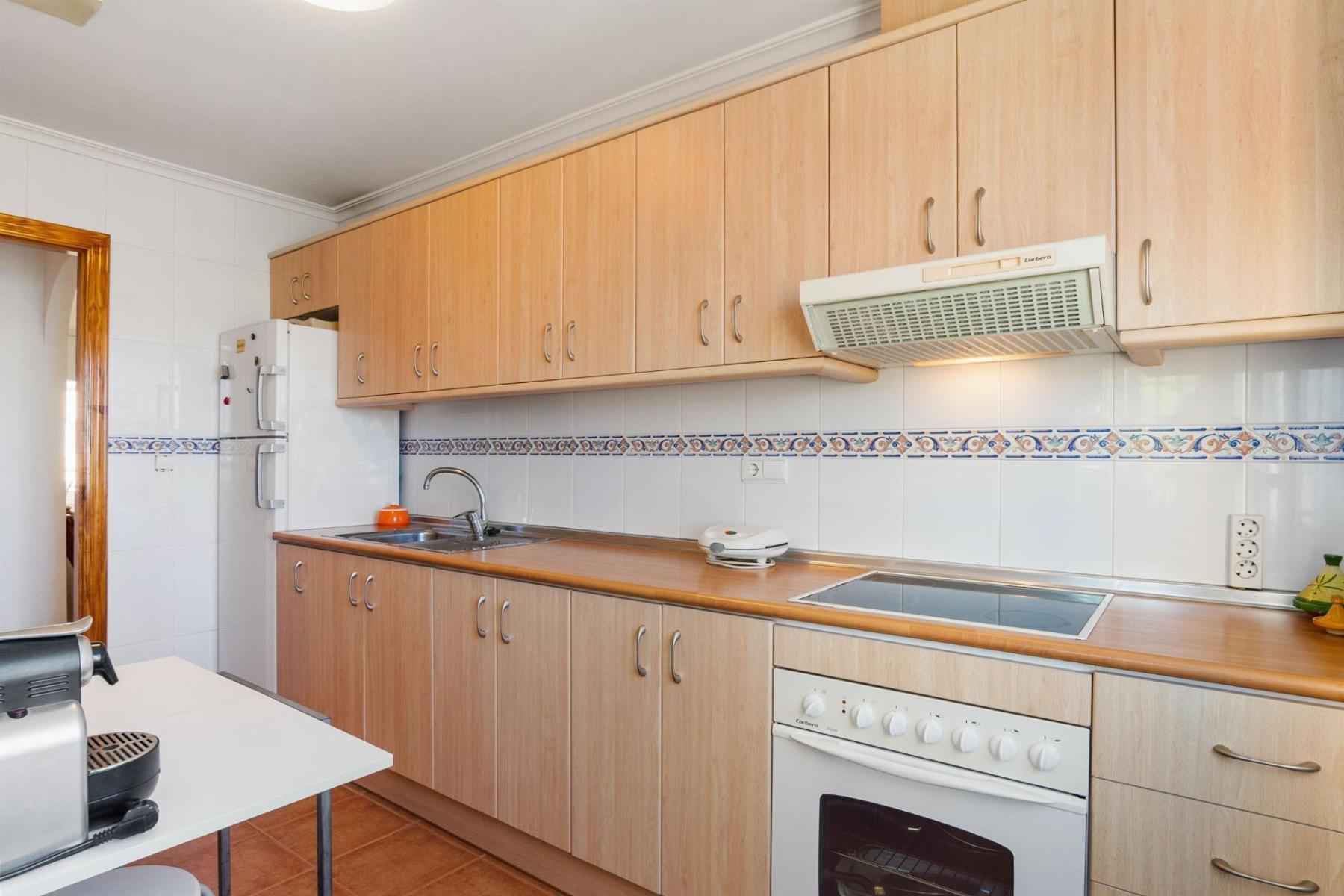 Apartamento con piscina privada y terraza en Dehesa de Campoamor — 3 dorm.