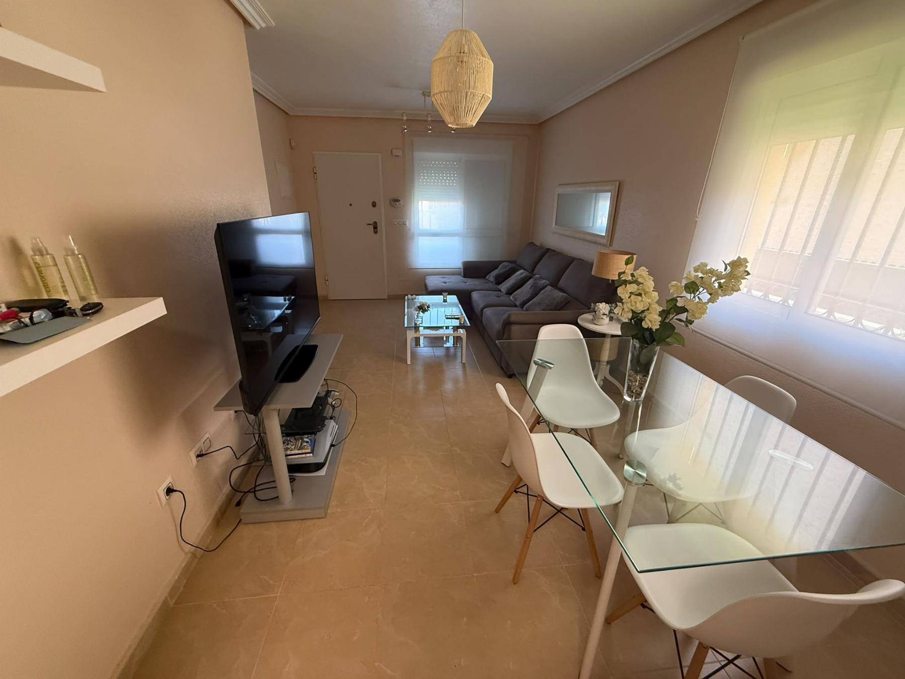 Bungalow con jardín privado y piscina en Lomas de Cabo Roig — 2 dorm.