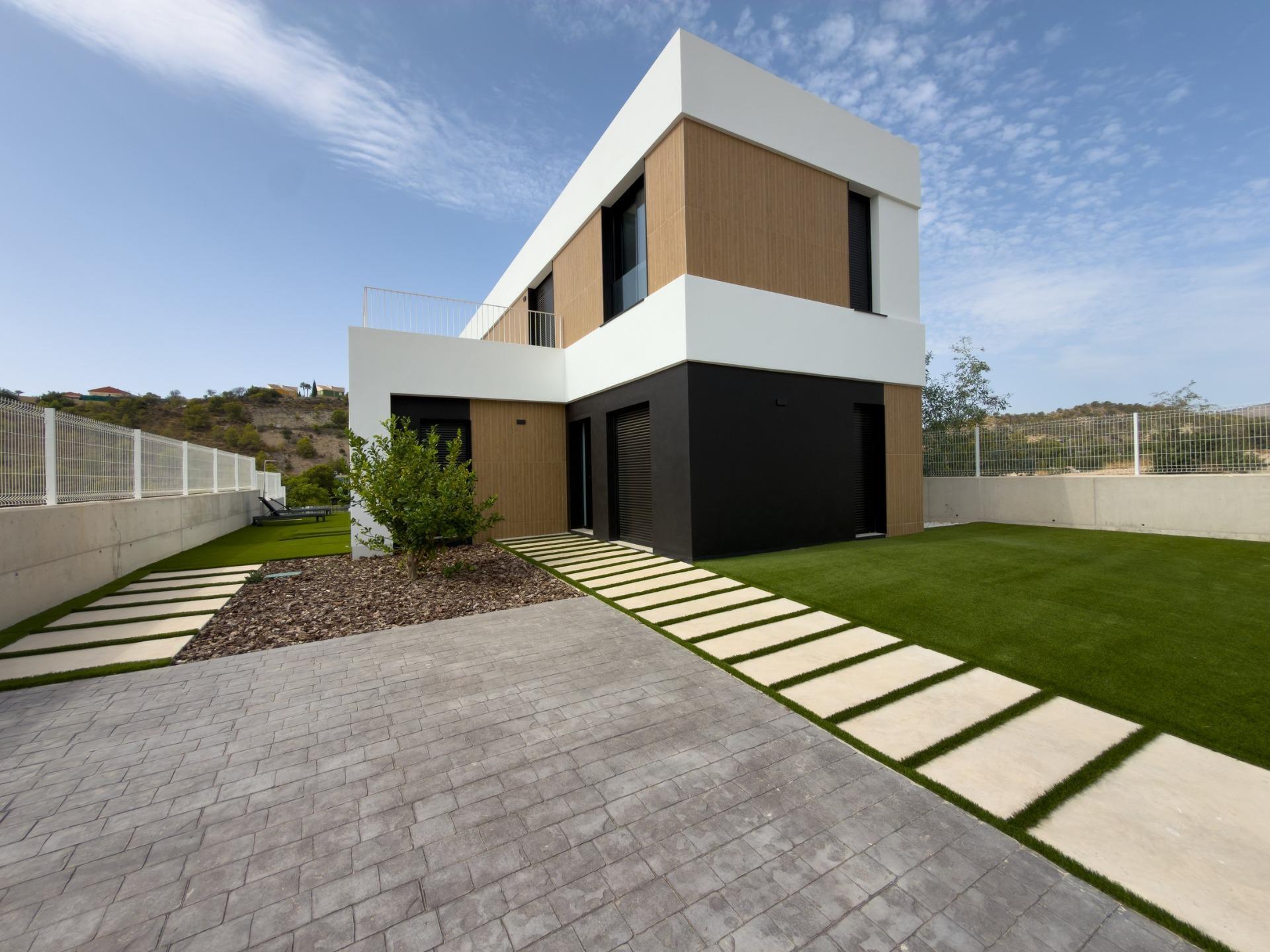 Villa de obra nueva con piscina privada y vistas al mar en Finestrat — 3 dorm.