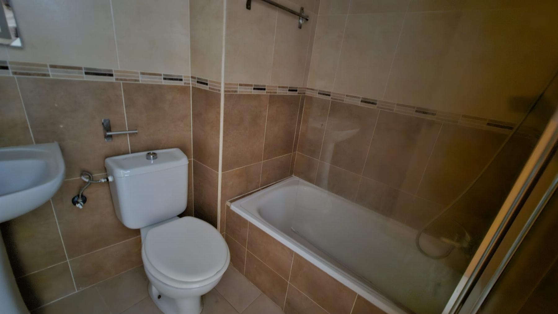 3-Bed Coastal Apartment 200m from Playa del Cura with Private Patio & Garage