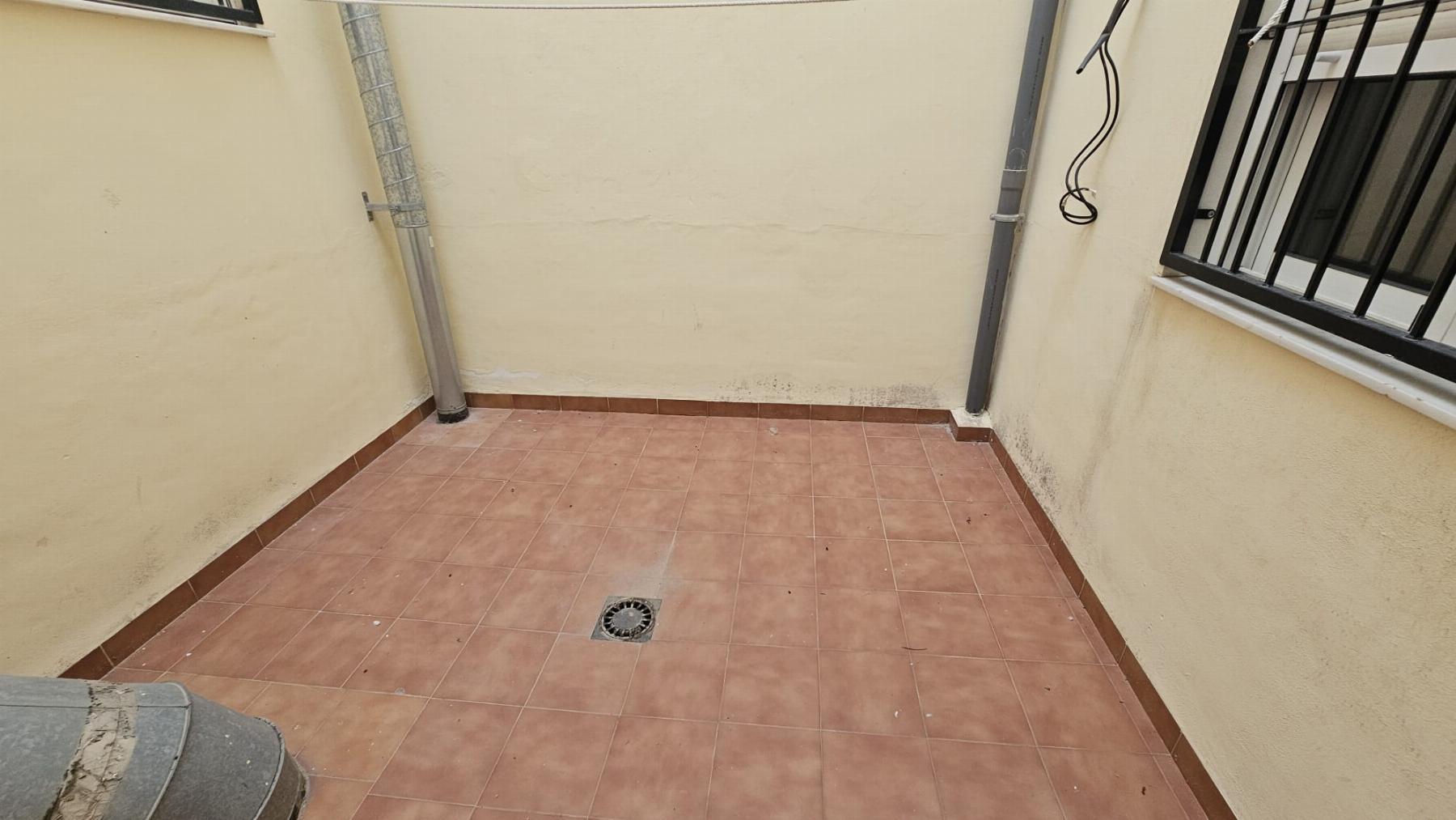 3-Bed Coastal Apartment 200m from Playa del Cura with Private Patio & Garage