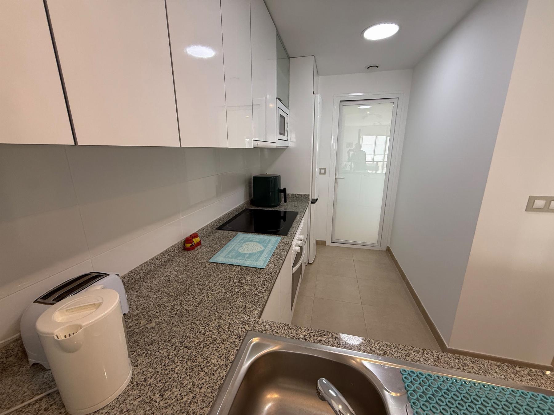 Apartamento con piscina privada en Lomas de Cabo Roig — 2 dorm. y terraza